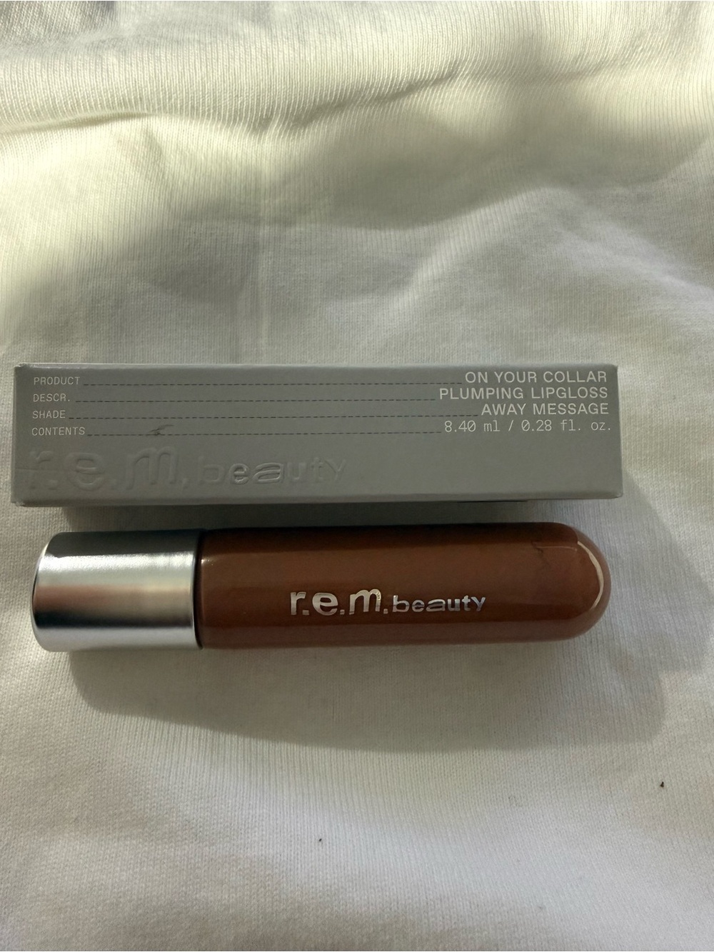 r.e.m. beauty On Your Collar Plumping Lipgloss - Away Message